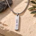 Men's necklace with Happiness and Protection symbols stacked, front view
