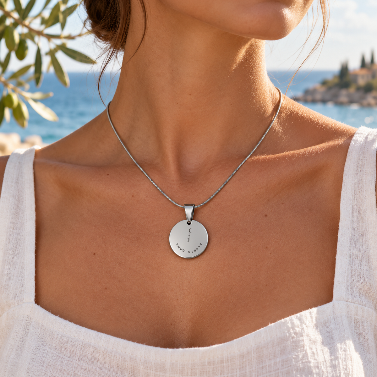 Women's Love and Joy necklace worn on the collarbone