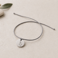 Confidence bracelet, front view with Nia Tar symbol engraving