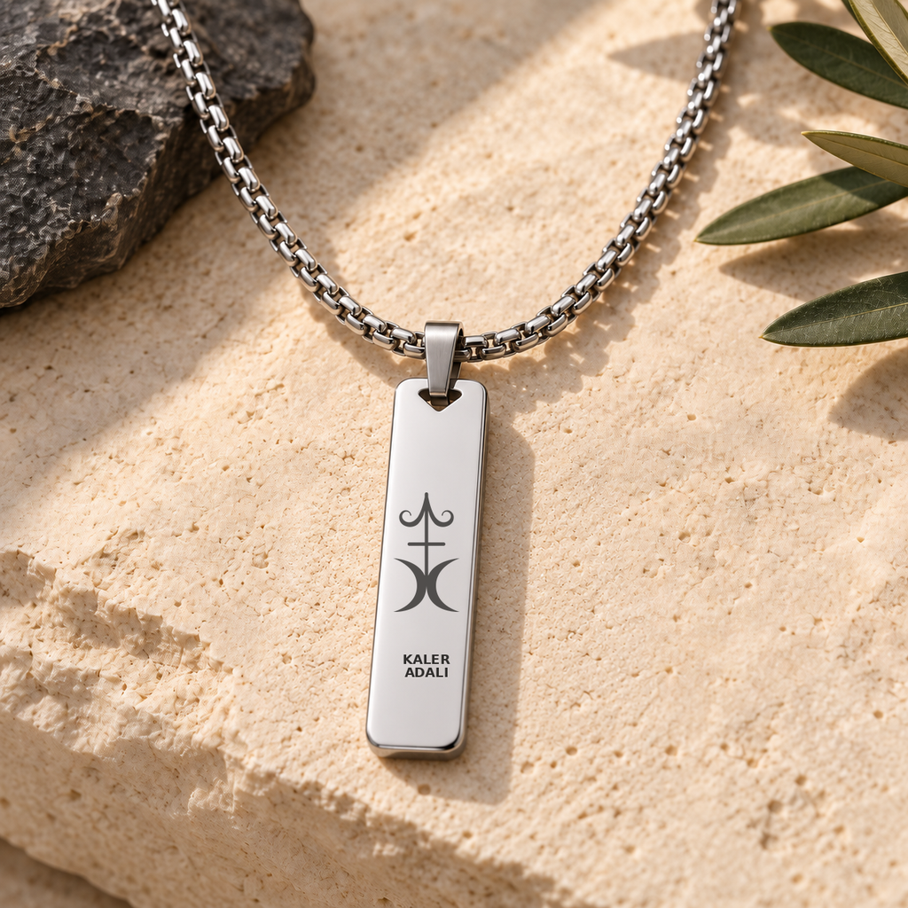 Men's silver necklace with Happiness symbol and Kaler Adali mantra, front view